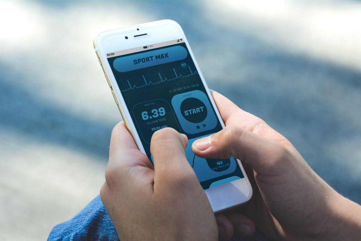 Woman Checking Progress with App Health Tracking Activity on Sma